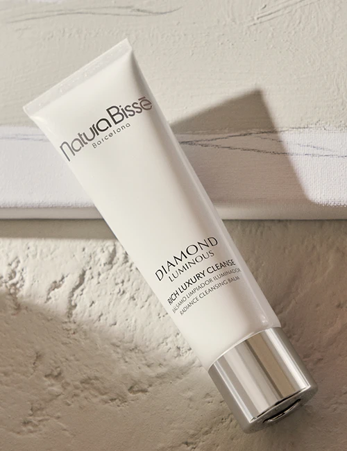 Diamond Rich Luxury Cleanse placed on top of a marble countertop. Product featured in our bestsellers.